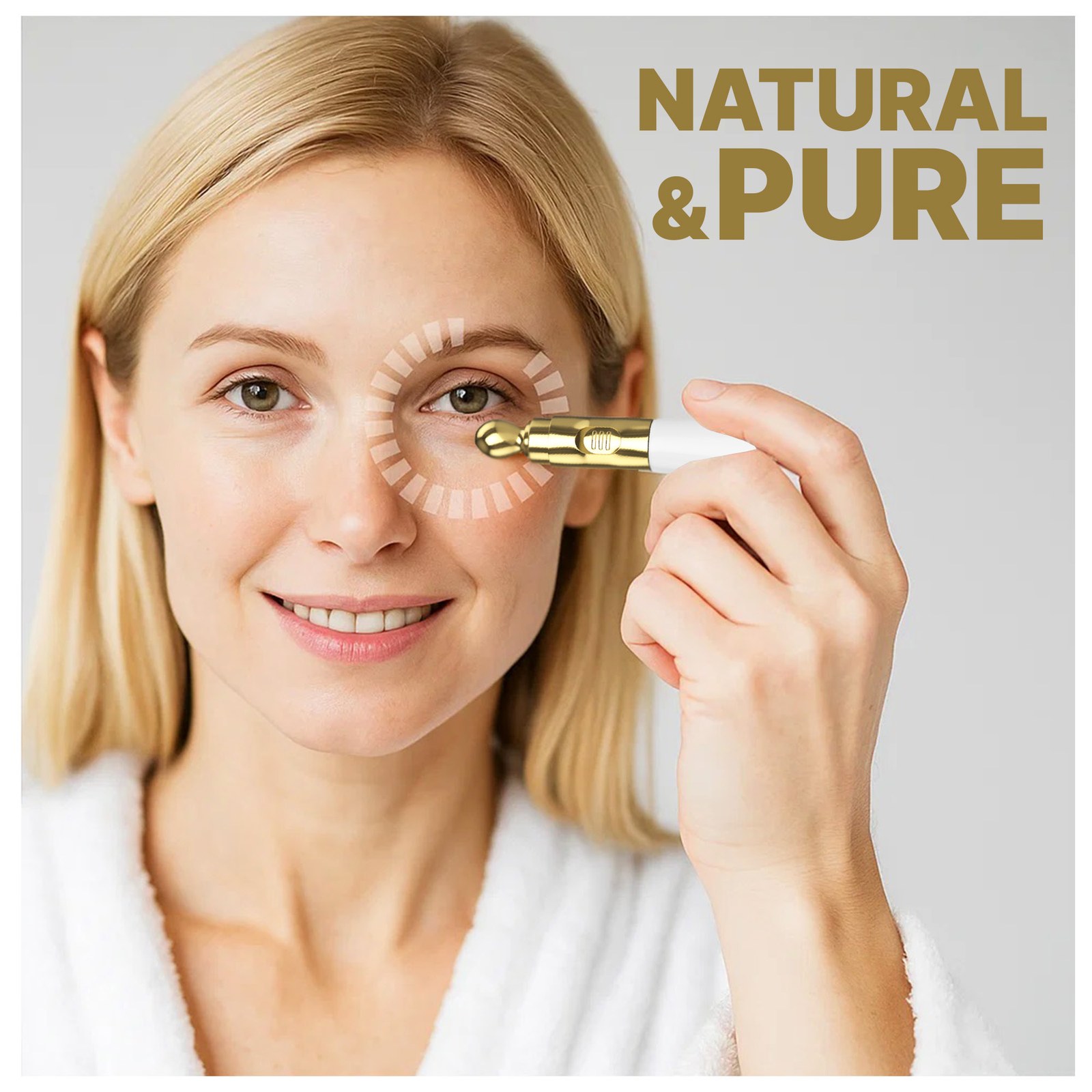 Smiling woman in a white robe using the gold applicator under her eye beside the words Natural and Pure