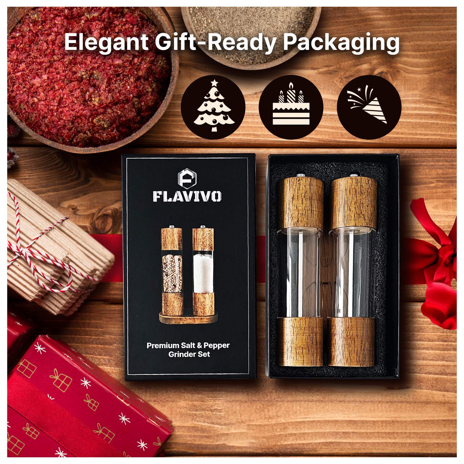 Open FLAVIVO gift box with both grinders on a festive wooden table
