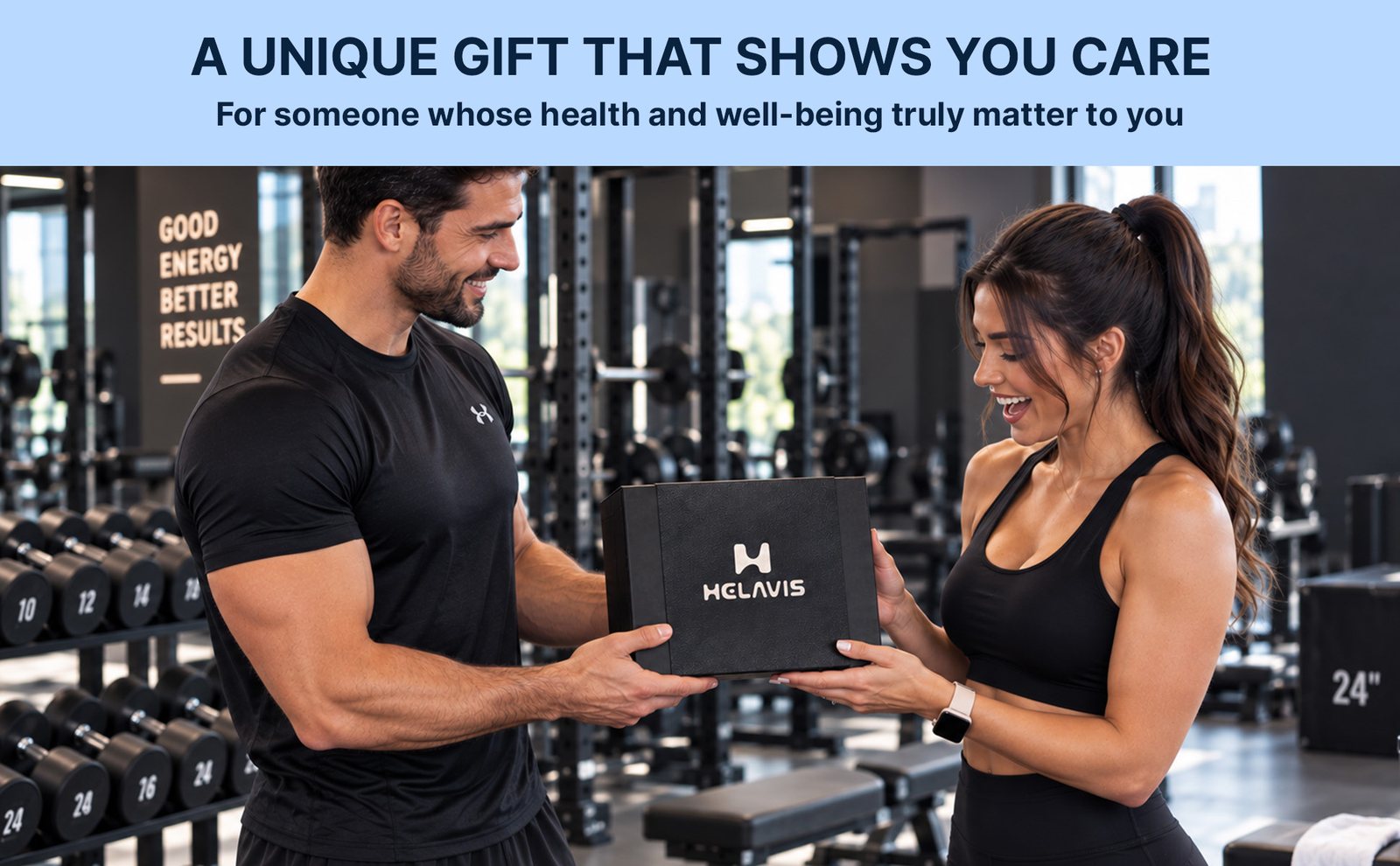 Two people in a gym exchanging the black HELAVIS gift box