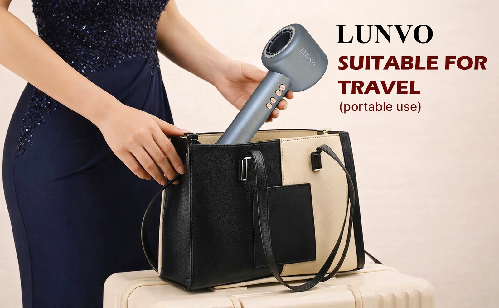 Woman in a navy dress placing the LUNVO hair dryer into a black tote bag