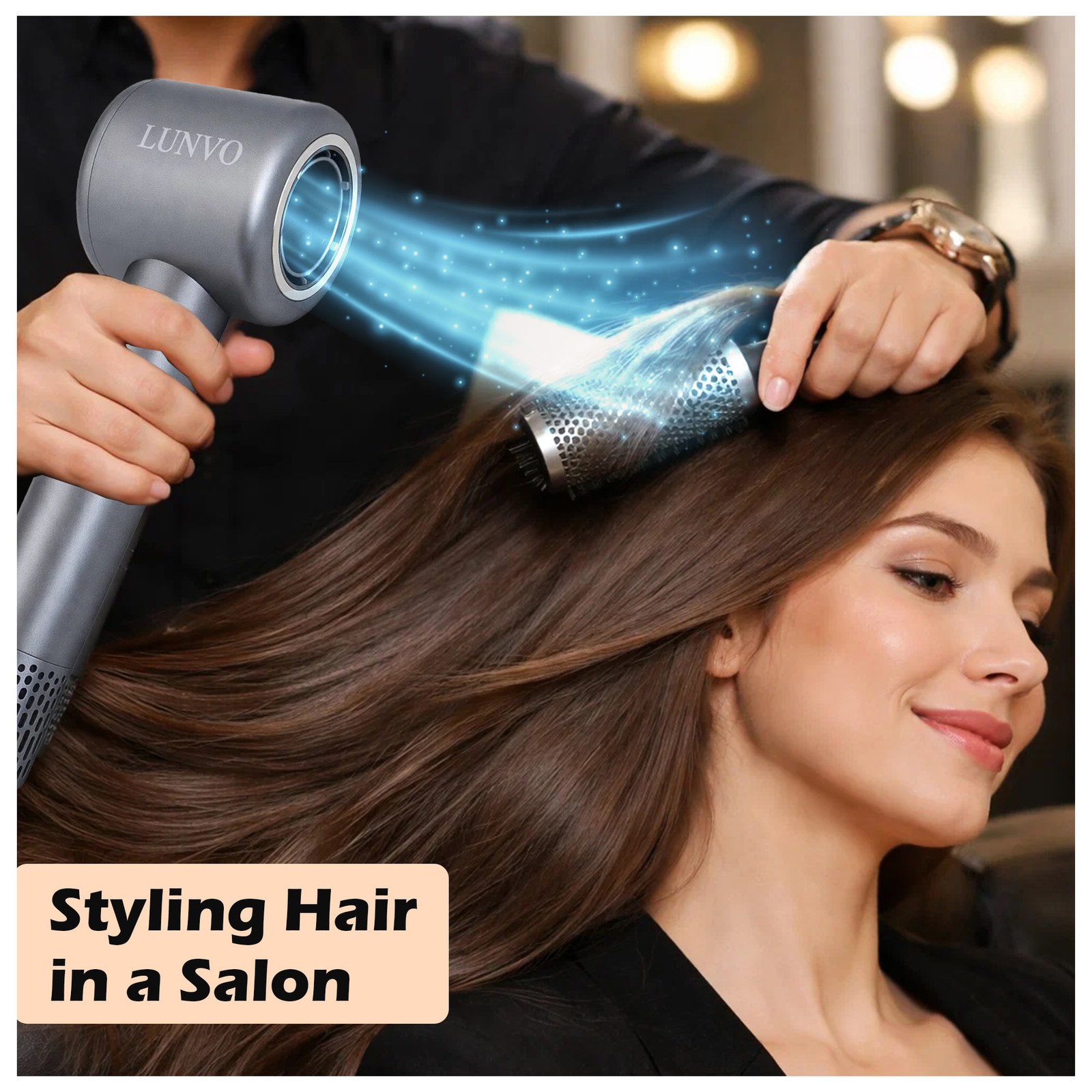 Stylist drying a woman's hair with the dryer and a round brush in a salon